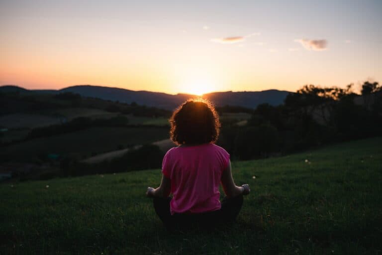 woman sitting in nature